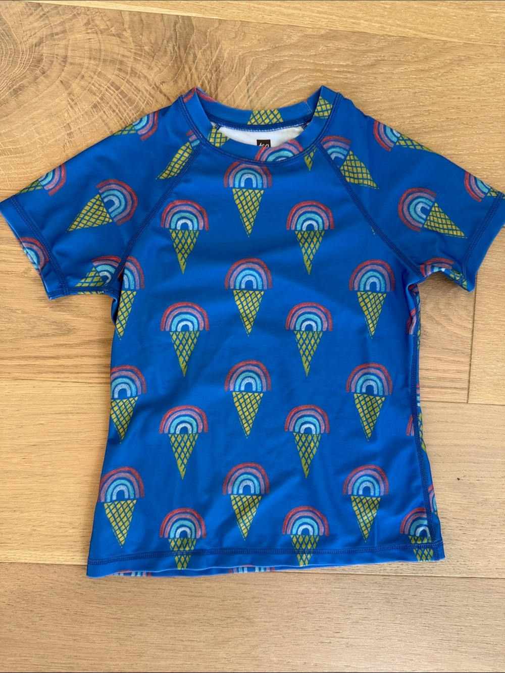 NWOT Tea Collection Kids Short-Sleeve Blue Rainbow Ice Cream Rash Guard size 8